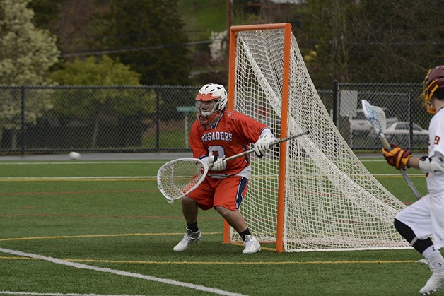 Eastside Catholic Crusaders goalie Cameron Cronk will play college lacrosse for the New Jersey Institute of Technology.