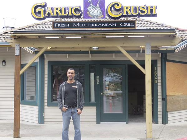 Matt Jabbour stands in front of his second Garlic Crush location