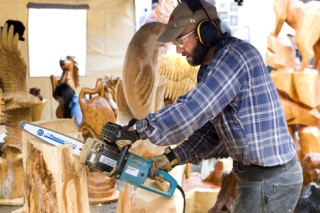 Chainsaw artist Lance Rigby works on a sculpture during Salmon Days this weekend. Rigby won an award for 'Artist in Action.'