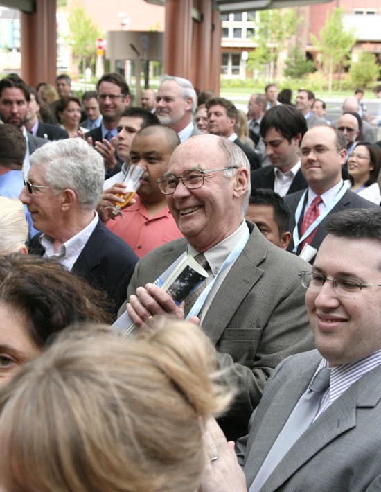 City Council Member Fred Butler joins the applause of several hundred people at a ribbon cutting ceremony for Swedish Hospital Issaquah July 7.