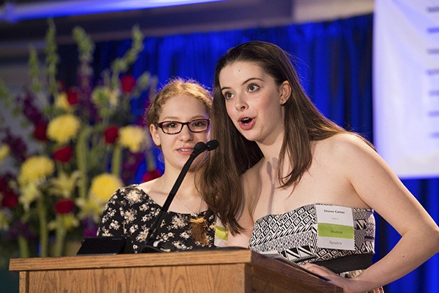Issaquah Middle School Eighth graders Hanna Chernin and Shona Carter spoke at the Issaquah Schools Foundation's Nourish Every Mind fundraiser to promote the foundation-funded Financial Literacy Curriculum.