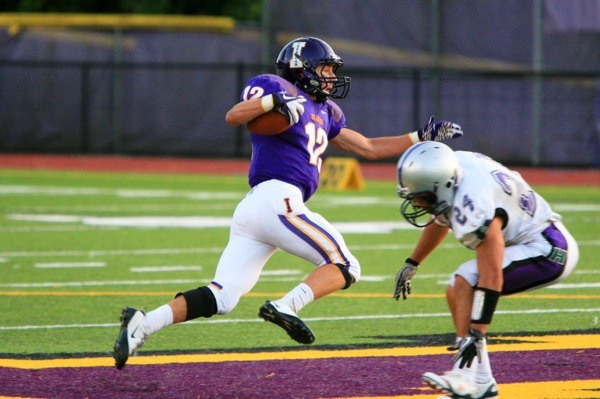 Issaquah's Reed Peterson makes a cutback on his way to an 83-yard kickoff return for a touchdown.