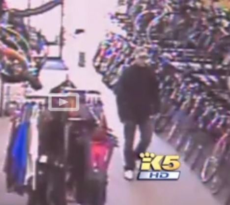 Store security video aired on King 5 news shows the man boldly walking into the store before wheeling out an $11