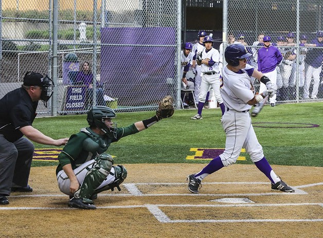 Issaquah Eagles senior infielder Andy Co takes a swing at a pitch in a contest against the Redmond Mustangs on March 27 in Issaquah.