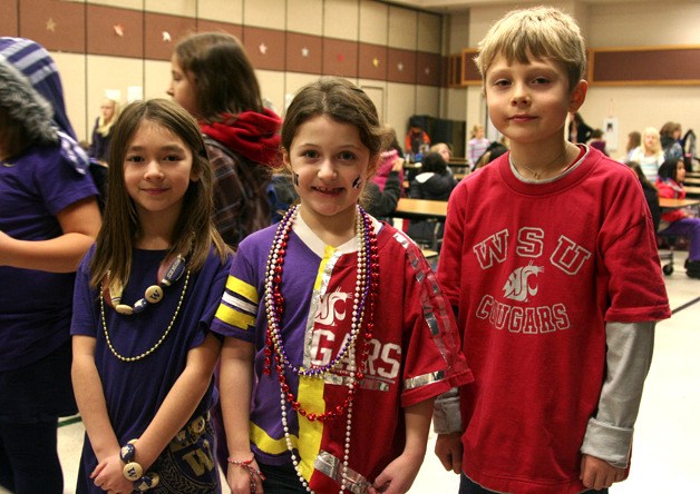 Challenger Elementary's Apple Cup rivalry spirit day has got kids talking about college. From the left