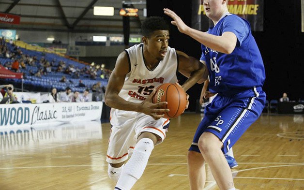 Eastside Catholic senior Mandrell Worthy drives to the hoop for a bucket against the Seattle Prep Panthers in the Class 3A third place/fifth place game on March 7 at the Tacoma Dome.