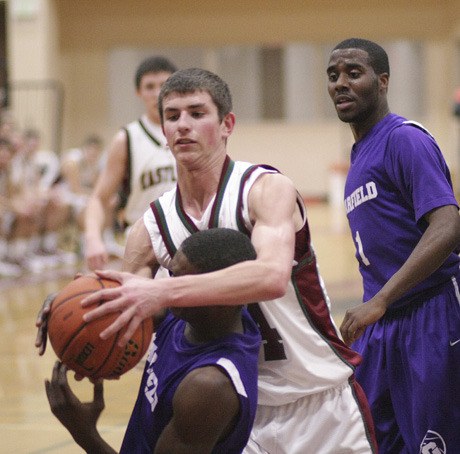 Eastlake's Kyle Hansen fights for a rebound Tuesday night