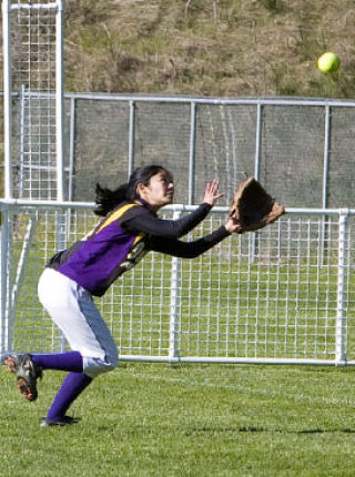 Issaquah’s Sarah Sekijima tracks down a fly ball Monday afternoon against Interlake.