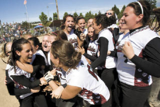 Members of the Eastlake High School Wolves celebrate last week after defeating Shadle Park for first place in the state tournament. Eastlake defeated the Spokane team