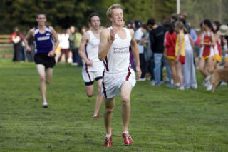 Eastlake’s Paul Kupcis pushes toward the finish line Oct. 8 at Beaver Lake.