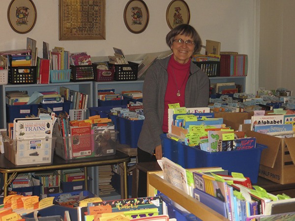 Ann Fletcher with hundreds of new or gently used books