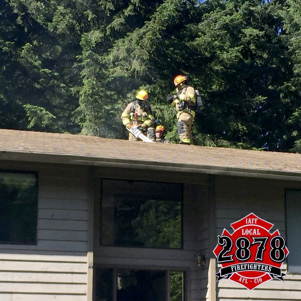 Photo courtesy of Eastside Fire Fighters/Facebook.comEastside Fire and Rescue at the house fire in Sammamish Wednesday morning.
