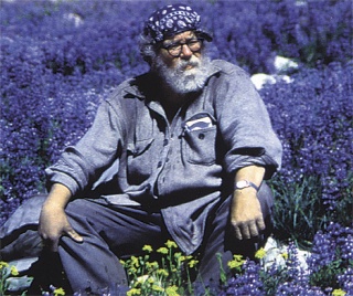 This classic photo of Harvey Manning was taken at Goat Rocks in the Cascades by hiking companion Larry Hanson.