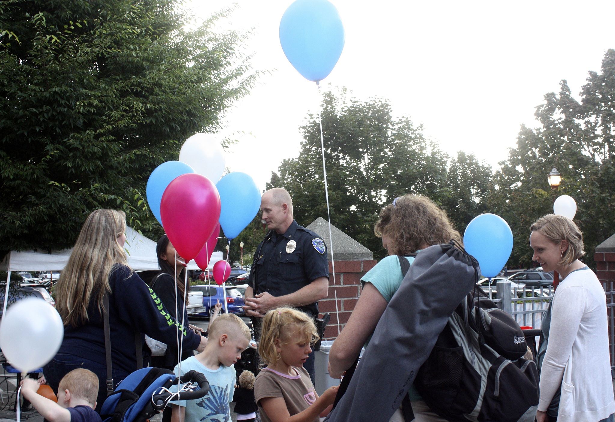 Issaquah police officers gather with residents on National Night Out on Aug. 2 at Issaquah City Hall. Nicole Jennings/staff photo
