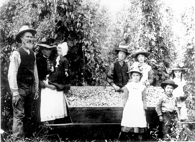 The J.J. Eastlick family with a large container of hops. This family settled in 1884 on Vaughn’s Hill