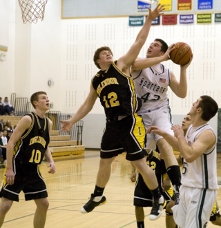 Jared Lemke powers up a fourth-quarter shot against Inglemoor Tuesday. He scored the bucket and was fouled.