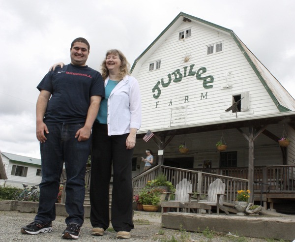 Caspian and mother Lynne Banki stand outside the Jubilee Farm barn where the 12th annual Autism Day WA will take place