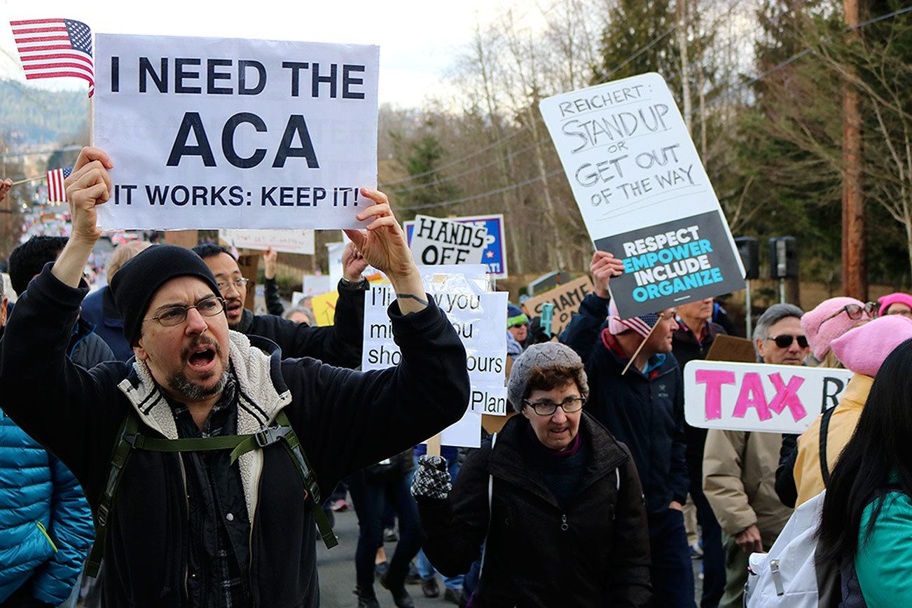 Affordable Care Act, immigration headline concerns of 1,000 anti-Reichert protesters