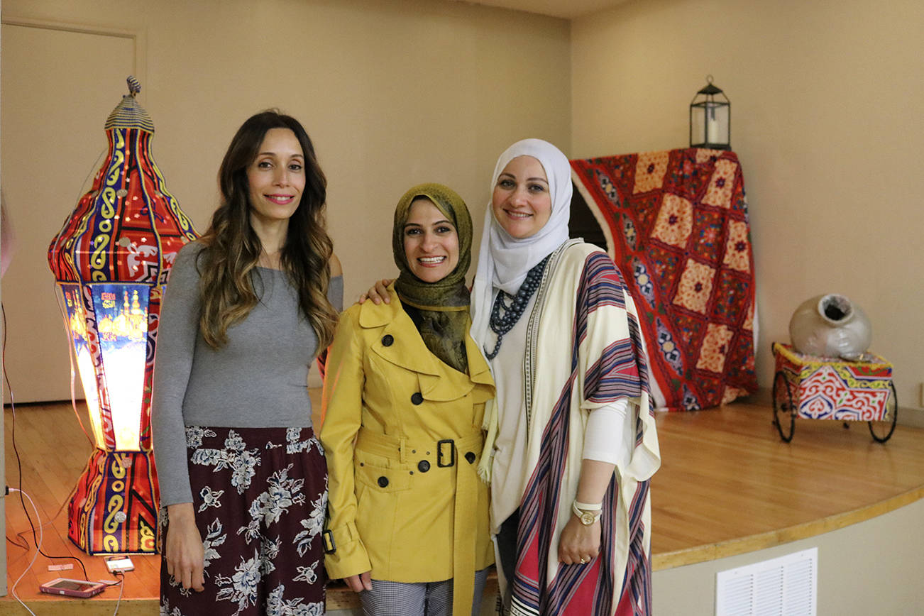 From left, Reham Shehata, Ghada Madkour and Yasmine Abeldayem all helped to organize the Iftar dinner. Nicole Jennings/staff photo