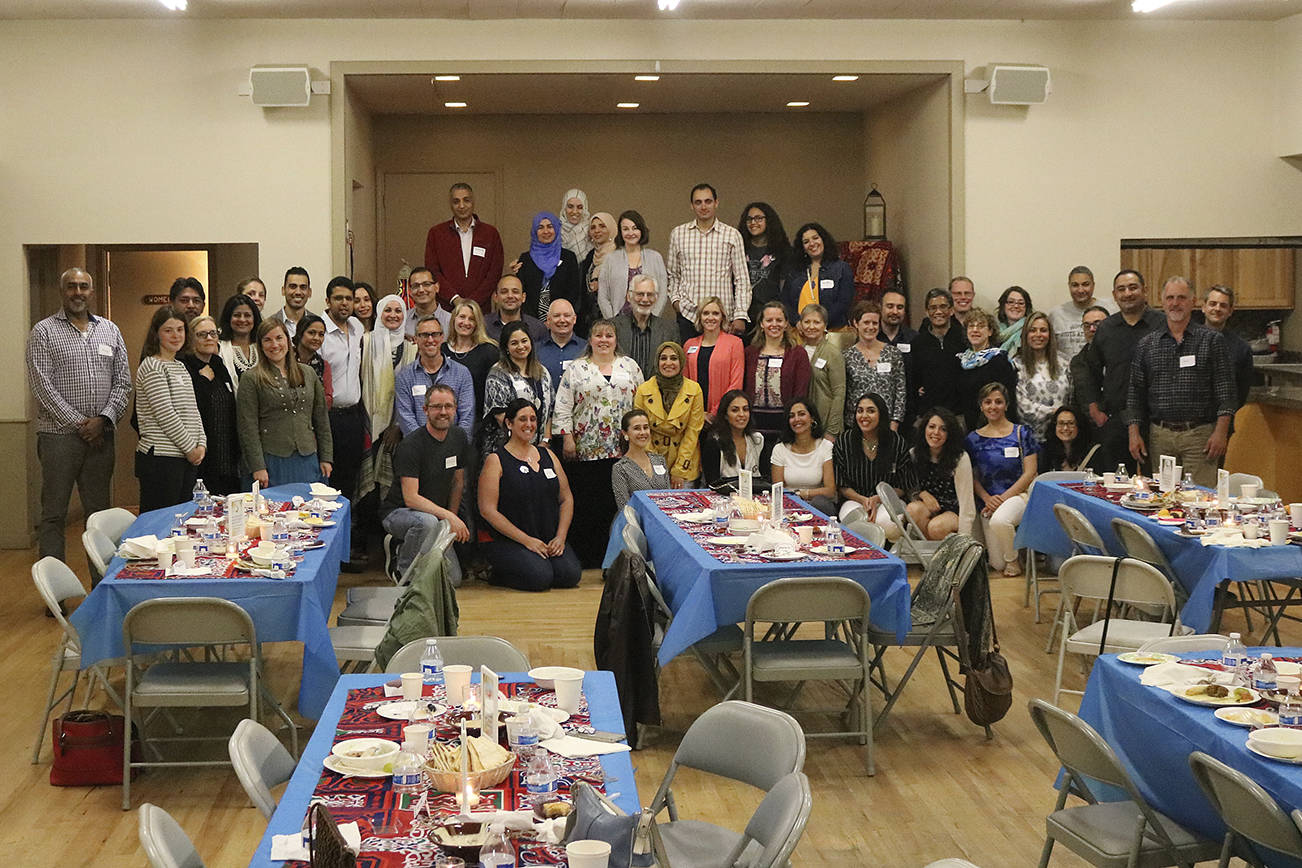 The idea of the dinner was for people with different heritages to get to know one another and share their cultural traditions. Nicole Jennings/staff photo