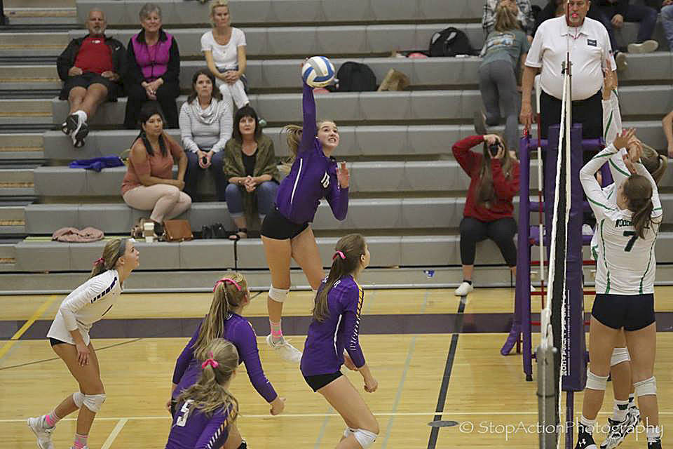 Photos courtesy of Don Borin/Stop Action Photography                                Issaquah junior outside hitter Elizabeth Gorski, who had five kills in the fourth and final set, spikes the ball against the Woodinville Falcons. Issaquah defeated Woodinville 3-1 on Oct. 5.
