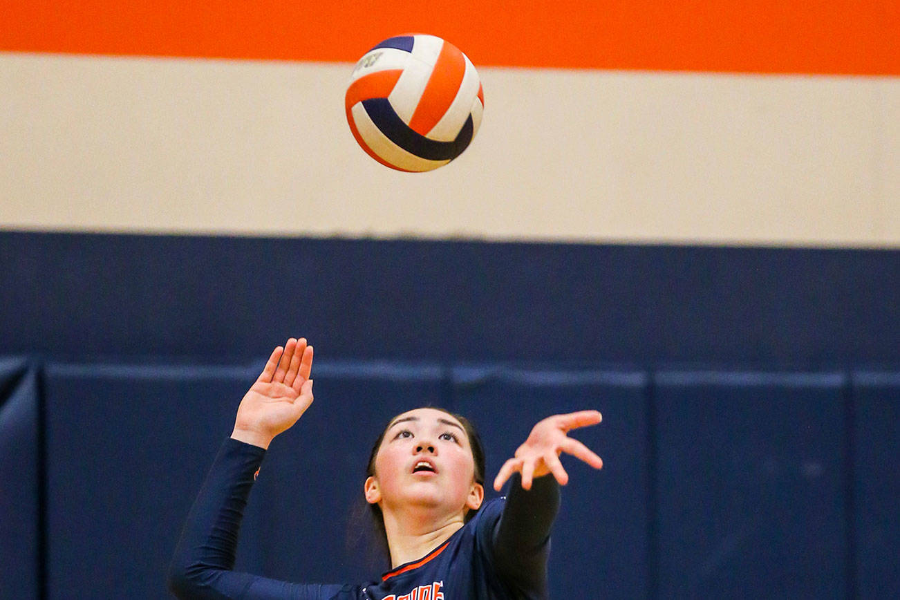 Photo courtesy of Rick Edelman/Rick Edelman Photography                                 The Eastside Catholic Crusaders put together an overall record of 3-1 at the Class 3A Metro League volleyball tournament en route to a third place finish on Oct. 28. Eastside Catholic defeated Rainier Beach, Bainbridge Island and Seattle Prep during the tournament. The Crusaders only loss came against the Ballard Beavers in the semifinals. Eastside Catholic will compete in the 2017 Sea-King volleyball tournament from Nov. 1 through Nov. 4. Eastside Catholic senior setter Mia Kirsch (pictured) prepares to make a serve against Bainbridge Island in the Metro quarterfinals.