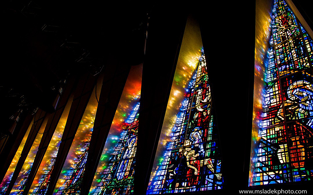 The chapel includes 14 stained glass windows, each 30 feet high and designed by world-famous French artist Gabriel Loire. Photo courtesy of Michael Sladek