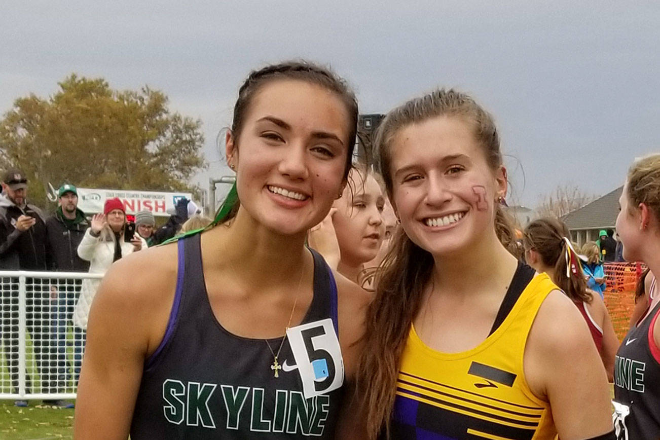 Photo courtesy of Susan Schlepp                                Skyline senior Geneva Schlepp, left and Issaquah senior Sami Corman, right, put together prolific performances at the Class 4A girls state Cross Country meet Nov. 4 at Willows Run Golf Course in Pasco. Schlepp captured fifth place with a time of 18:01.3. Corman earned ninth place with a time of 18:27.3. Issaquah’s Kenna Clawson earned eighth place individually with a time of 18:25.2.