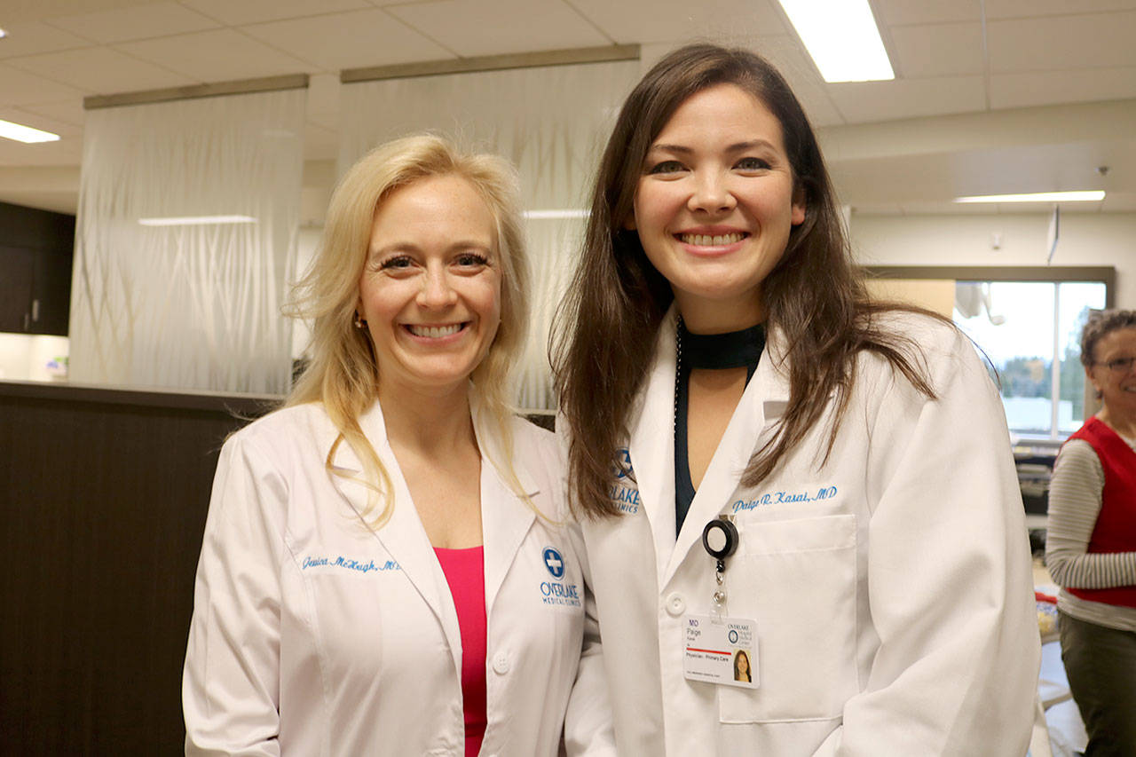 Doctors Jessica McHugh and Paige Kasai spent the morning showing people around the new clinic. (Evan Pappas/Staff Photo)