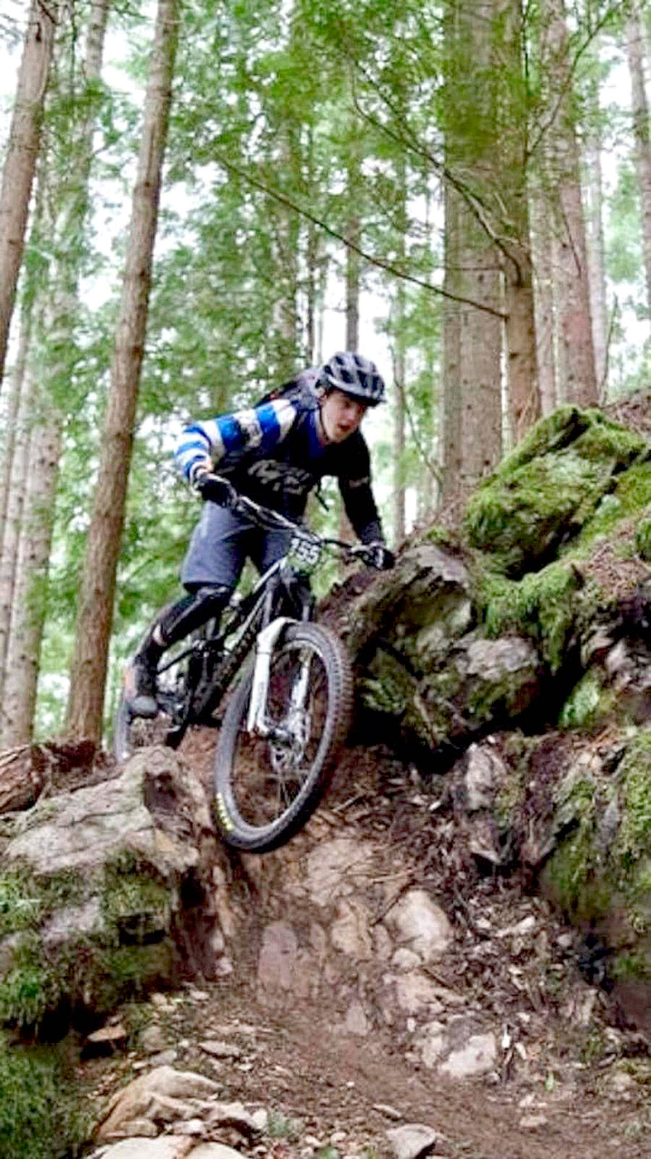 Mount Si Mountain Biker Jakob Freudenberg eases over a drop in the Tiger Mountain Enduro race earlier this year. He claimed a spot on the podium for his race. (Courtesy Photo)                                Courtesy Photo                                 Mount Si Mountain Biker Jakob Freudenberg eases over a drop in the Tiger Mountain Enduro race earlier this year. He claimed a spot on the podium for his race.