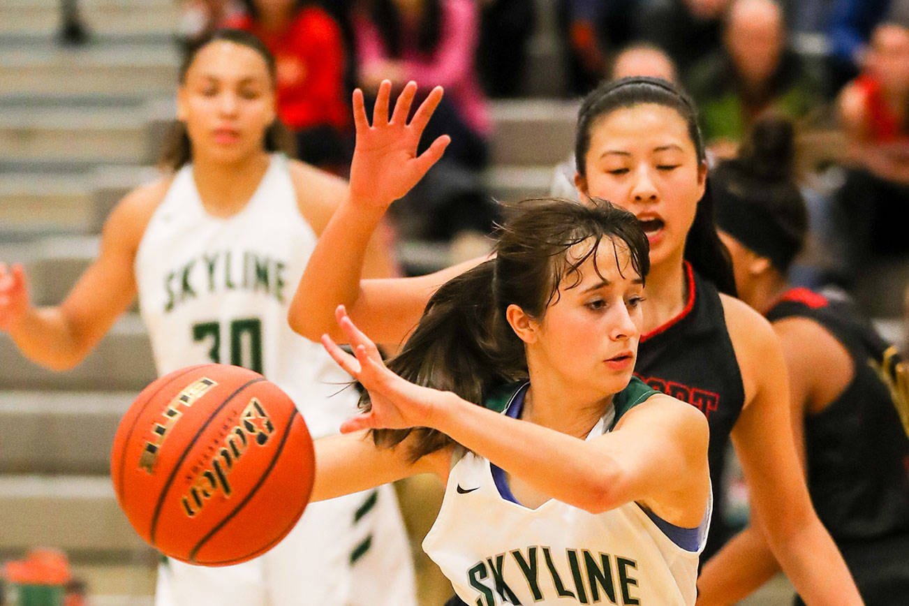 Photo courtesy of Rick Edelman/Rick Edelman Photography                                The Newport Knights girls basketball team earned a 68-58 win against the Skyline Spartans on Dec. 15 at Skyline High School in Sammamish. Skyline dropped to 4-2 overall with the loss. Skyline senior guard Annie Taylor (pictured) dribbled the ball toward the basket against Newport.