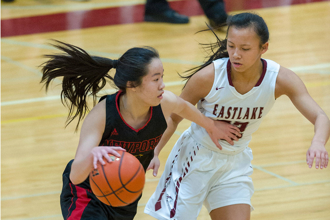 Photo courtesy of Patrick Krohn/Patrick Krohn Photography                                Eastlake Wolves senior guard Gina Marxen, right, puts pressure on Newport guard Nicole Chan, left, as she dribbled the ball upcourt in a matchup between KingCo 4A teams on Feb. 1.