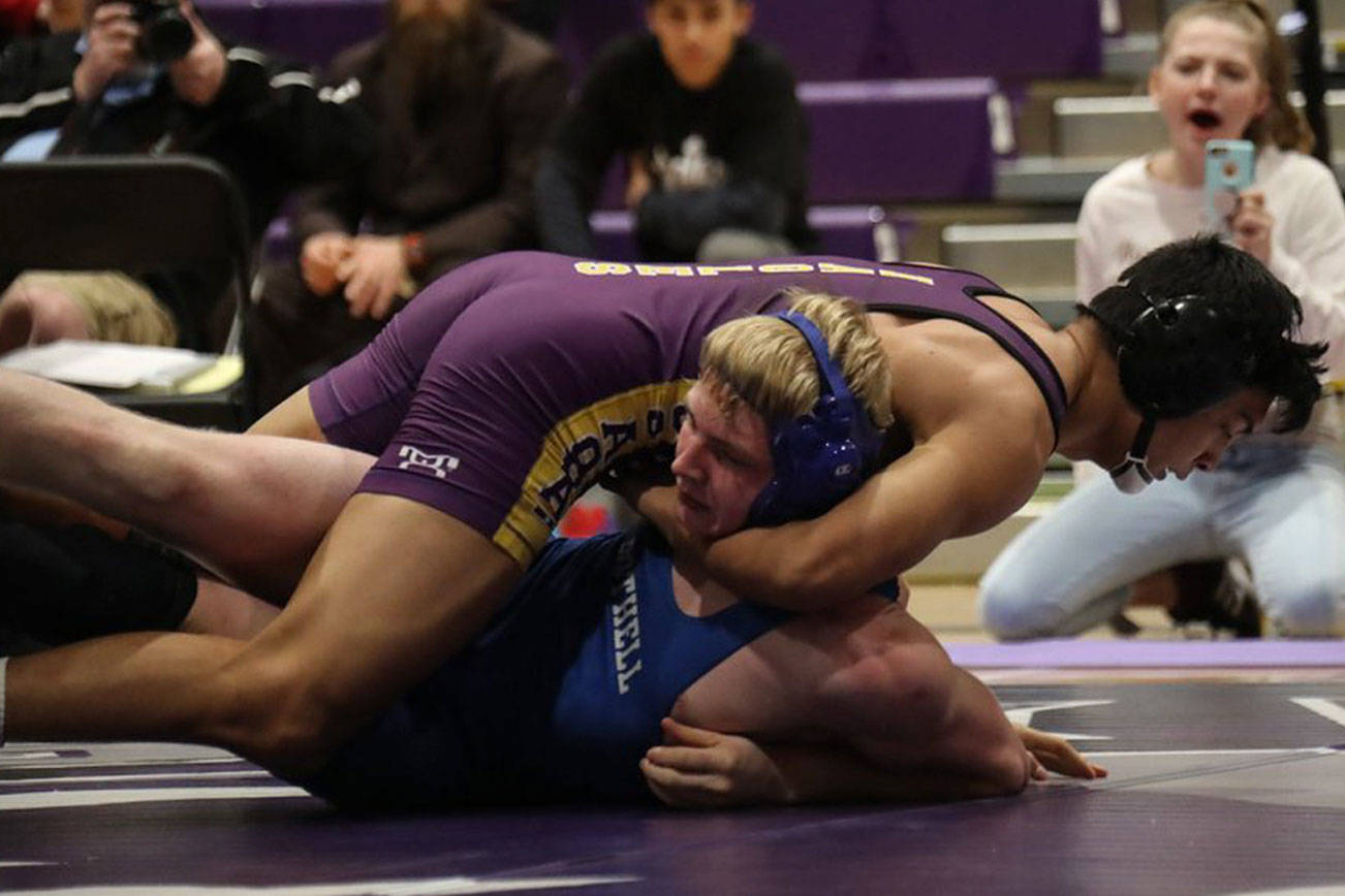 Photo courtesy of Don Borin/Stop Action Photography                                Issaquah’s Kaleb Solusod captured his second consecutive KingCo 4A tournament championship. Solusod defeated Bothell’s Jay Smith 9-4 in the 170-pound title match.
