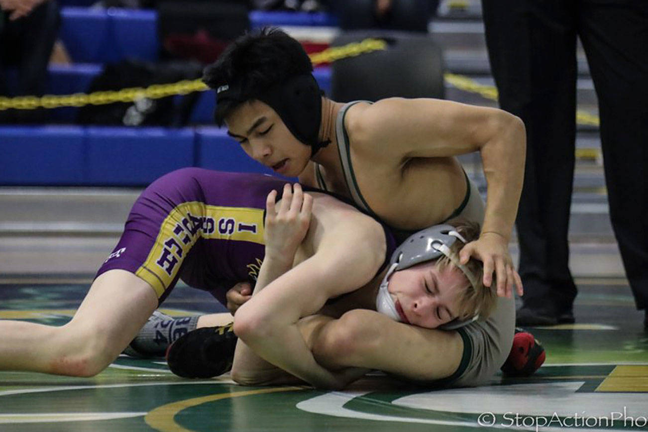 Photo courtesy of Don Borin/Stop Action Photography                                Skyline Spartans junior wrestler Kenta Despe, right, battles with Issaquah sophomore Carson Tanner, left in the 113-pound title match at the Class 4A Region II tournament at Tahoma High School in Maple Valley on Feb. 10. Despe defeated Tanner 7-3 in the matchup between rivals. Despe will face Riley Burgess (Moses Lake) in the first round of the Mat Classic Class 4A state tournament 113-pound weight division on Feb. 16 at the Tacoma Dome. Tanner will face Chase Poston (Olympia) in the first round of the tournament on Feb. 16 at the Tacoma Dome.