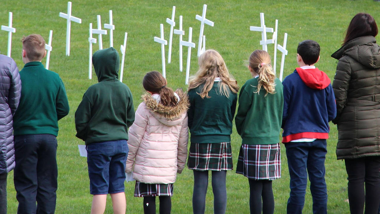 Students at St. Monica School, a private Catholic school based in Mercer Island, prayed for the 17 victims of the Parkland school shooting. Courtesy of Krista Pittiglio