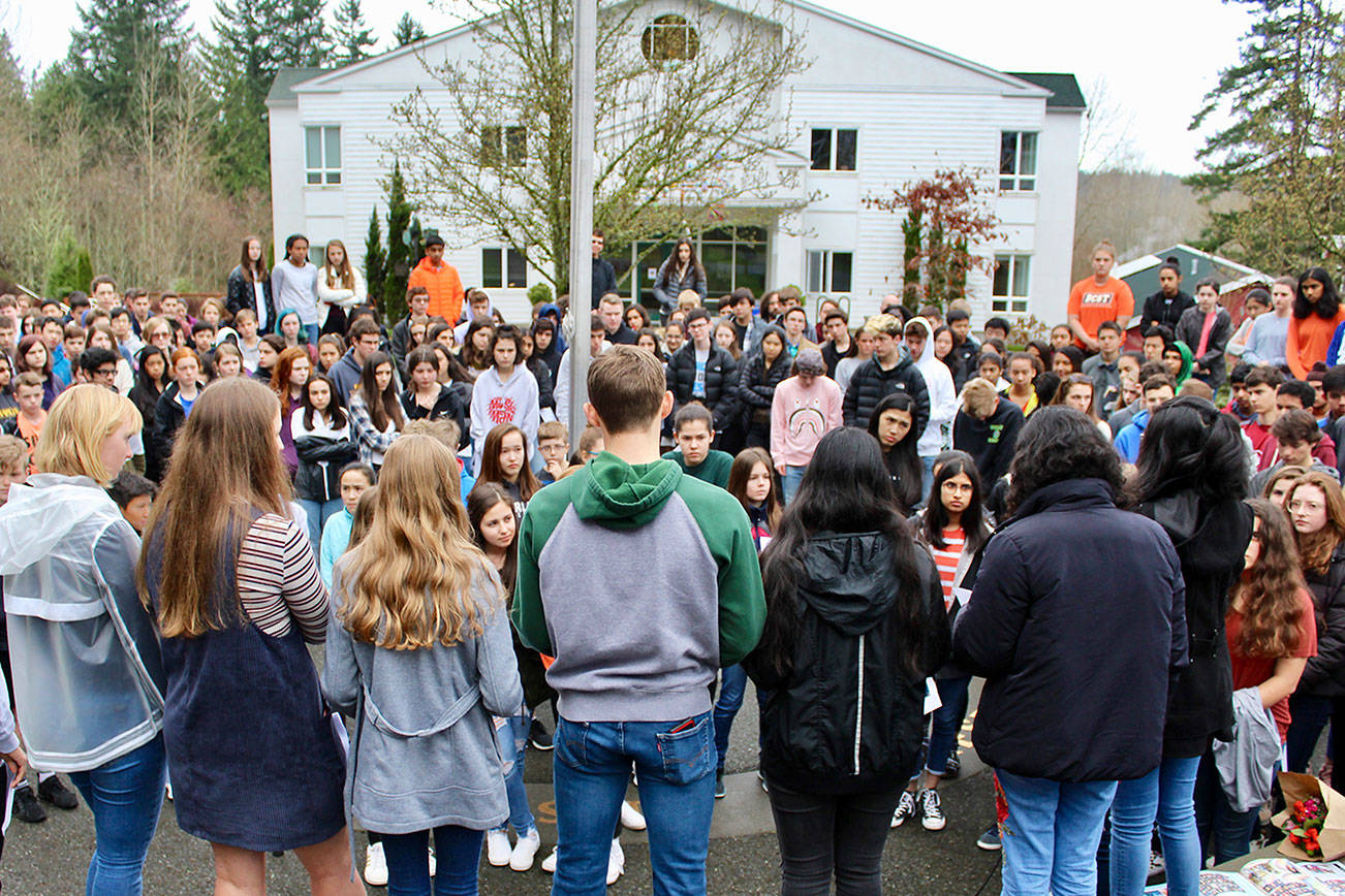 Overlake students participate in a walkout at the Redmond school, calling on legislators and Congress to enact “common sense” gun control laws. Courtesy of Susan Messier, the Overlake School