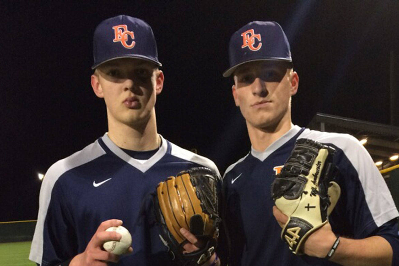 Shaun Scott, staff photo                                Eastside Catholic Crusaders junior pitchers Jacob Dalhstrom, left, and Will Armbruester, right, will be the Crusaders top two starting pitchers during the 2018 season. Dahlstrom has already committed to playing baseball at the University of Washington.