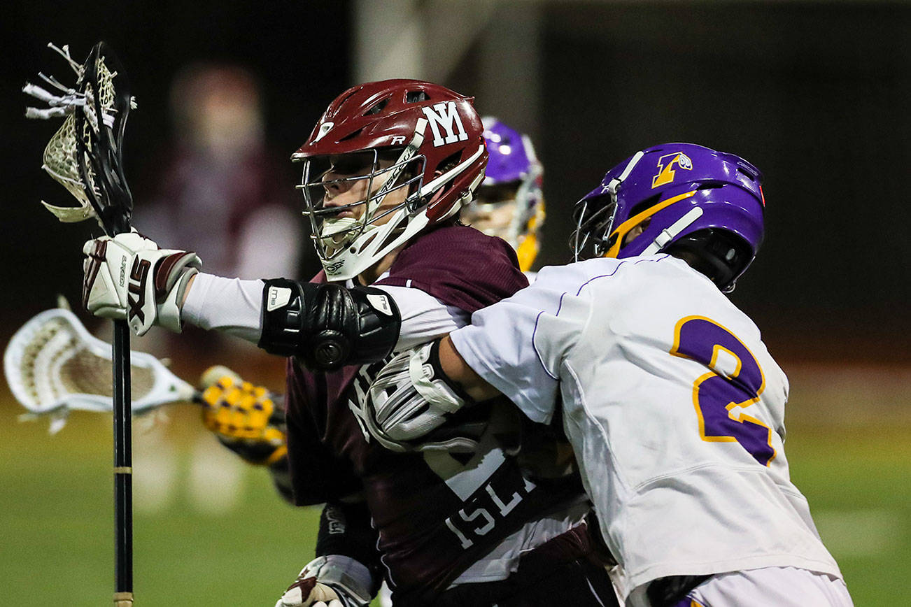 Photo courtesy of Rick Edelman/Rick Edelman Photography                                The Mercer Island Islanders boys lacrosse team registered a 12-5 victory against the Issaquah Eagles on March 30 at Issaquah High School. Issaquah player Max Dahlquist scored a team-high three goals in the loss. Issaquah currently has an overall record of 6-3.