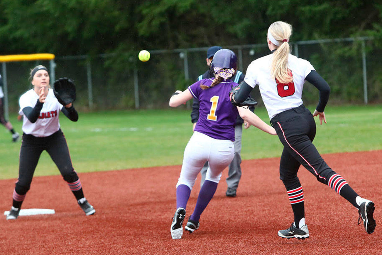 Photo courtesy of Don Borin/Stop Action Photography                                Issaquah Eagles softball player Athena Benjamin gets caught between the basepaths against the Mount Si Wildcats in a KingCo 4A contest on April 5. Mount Si defeated Issaquah, 6-4.