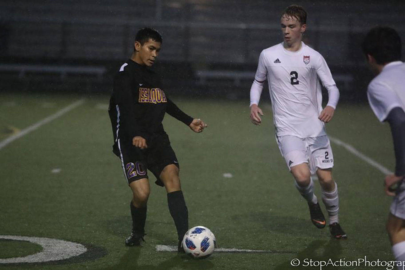 Photo courtesy of Don Borin/Stop Action Photography                                Issaquah Eagles midfielder Dawson Oen, left, controls the ball while being defended by Mount Si midfielder Jared Davies, right, in a matchup between KingCo 4A soccer teams on April 13.