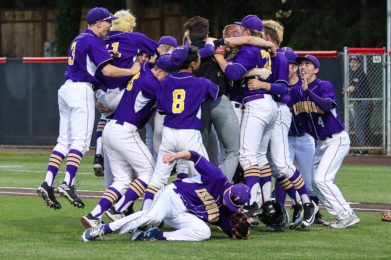 Photo courtesy of Rick Edelman/Rick Edelman Photography                                The Issaquah Eagles baseball team celebrates after defeating the Skyline Spartans 4-2 in a winner-to-state, loser-out KingCo 4A playoff game on May 11 at Bannerwood Park in Bellevue.