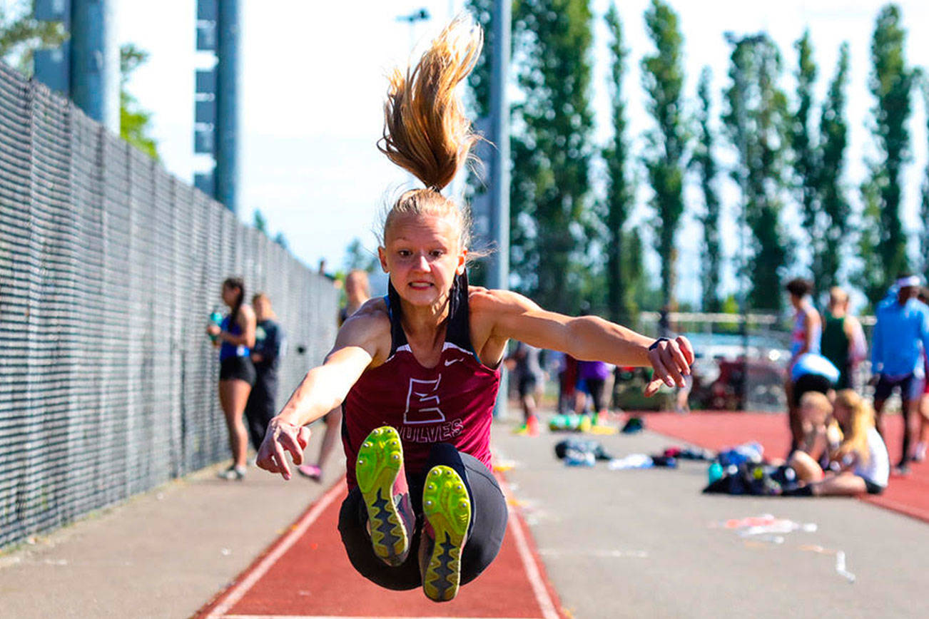 Photo courtesy of Don Borin/Stop Action Photography                                Eastlake Wolves junior Ellie Talius leapt to a first place finish with a leap of 17 feet, 7.25 inches in the long jump at the Class 4A District II track championships on May 18 at the Southwest Athletic Complex in Seattle.
