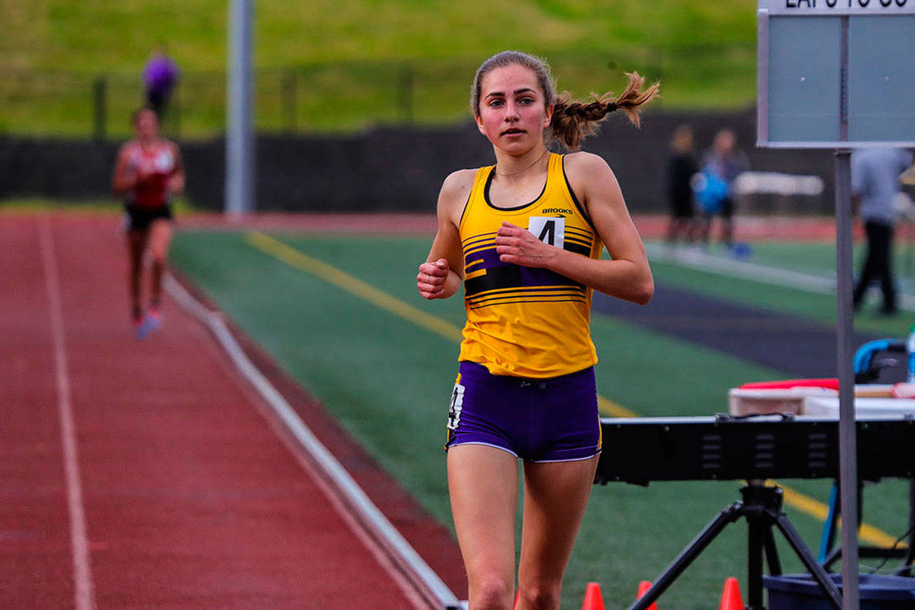 Photo courtesy of Don Borin/Stop Action Photography                                Issaquah Eagles freshman Julia David-Smith (pictured) clocked a time of 10:38.48, earning first place in the 3200 at at the Class 4A District II track championships on May 18 at the Southwest Athletic Complex in Seattle. Issaquah senior Kenna Clawson finished in second place with a time of 11:07.34.