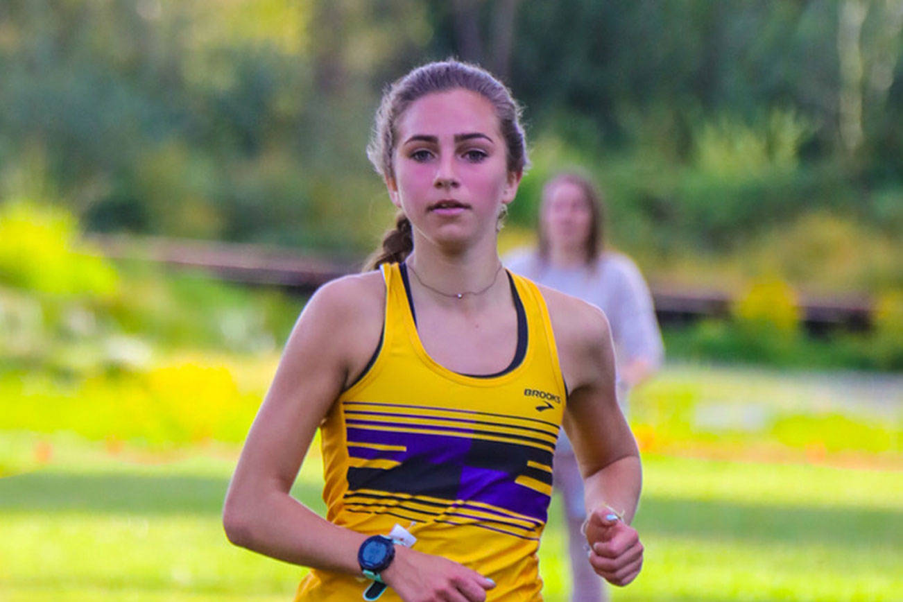 Issaquah Eagles sophomore Julia David-Smith cruised to a first-place finish with a time of 19:24.67 at a cross country meet featuring the Newport Knights, Mount Si Wildcats and Issaquah squads on Sept. 12 at Kelsey Creek Park in Bellevue. Photo courtesy of Don Borin/Stop Action Photography