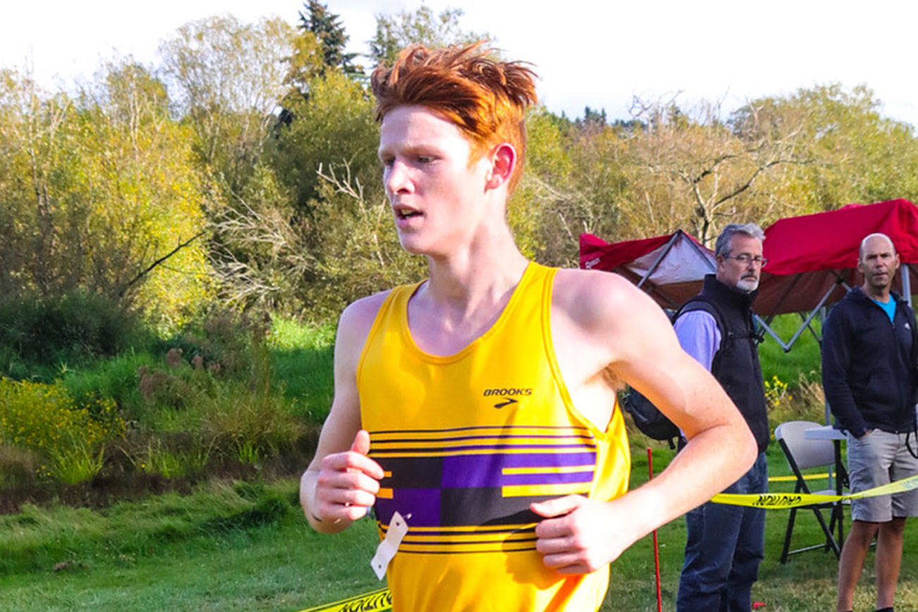 Issaquah Eagles senior cross country runner Sam Griffith captured first place with a time of 16:23.18 in a meet featuring the Mount Si Wildcats, Newport Knights and Issaquah squads on Sept. 12 at Kelsey Creek Park in Bellevue. Photo courtesy of Don Borin/Stop Action Photography