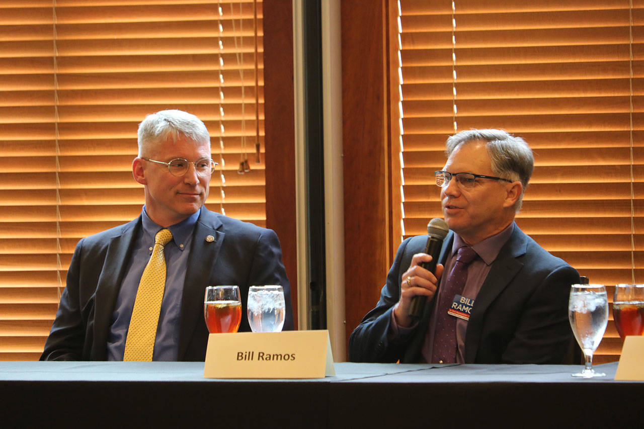 Chad Magendanz and Bill Ramos give their perspectives on capital gains tax and income tax. Evan Pappas/Staff Photo