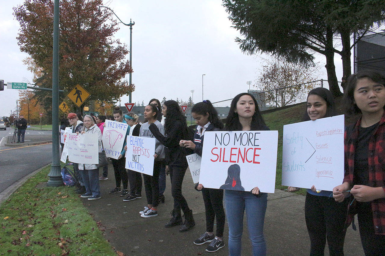 Skyline High School students and community protest perpetuation of rape culture following ISD lawsuit. Some signs read, “Private Property” with an image of a uterus. Another read, “Blame rapists, NOT victims.” another read, “No More Silence.” Madison Miller/staff photo.