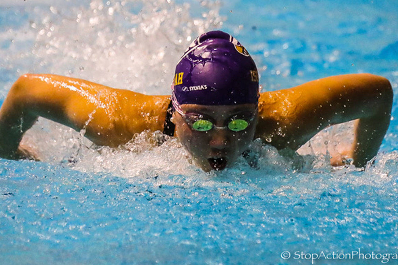Issaquah Eagles junior swimmer Isabelle Huynh (pictured) earned fifth place in the 50 free with a time of 23.99 and eighth place in the 100 fly with a time of 56.43 at the Class 4A state swim meet on Nov. 10 at the King County Aquatic Center in Federal Way. Photo courtesy of Don Borin/Stop Action Photography