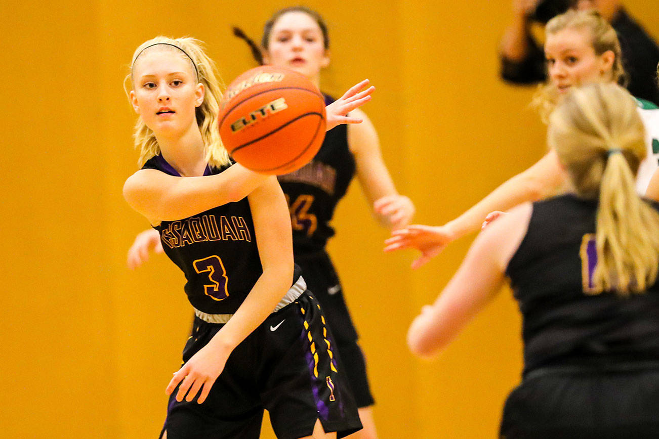 The Issaquah Eagles girls basketball team earned a 70-51 win against the Skyline Spartans on Dec. 7. Issaquah improved its overall record to 4-1 with the victory. Issaquah sophomore guard Camryn Gibson (pictured) makes a pass to one of her teammates during the matchup against Skyline. Photo courtesy of Rick Edelman/Rick Edelman Photography