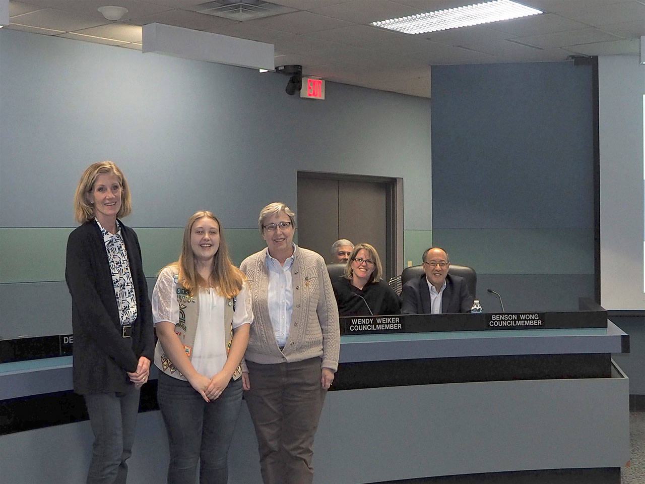 The Mercer Island City Council honored Kari Anderson (center) for earning the Girl Scout Gold Award at a council meeting in 2018. Also pictured is Jennifer Wright, MISD executive director of Learning Services (right) and Mayor Debbie Bertlin. Photo courtesy of Janet Piehl/Girl Scout Leader Troop 43142